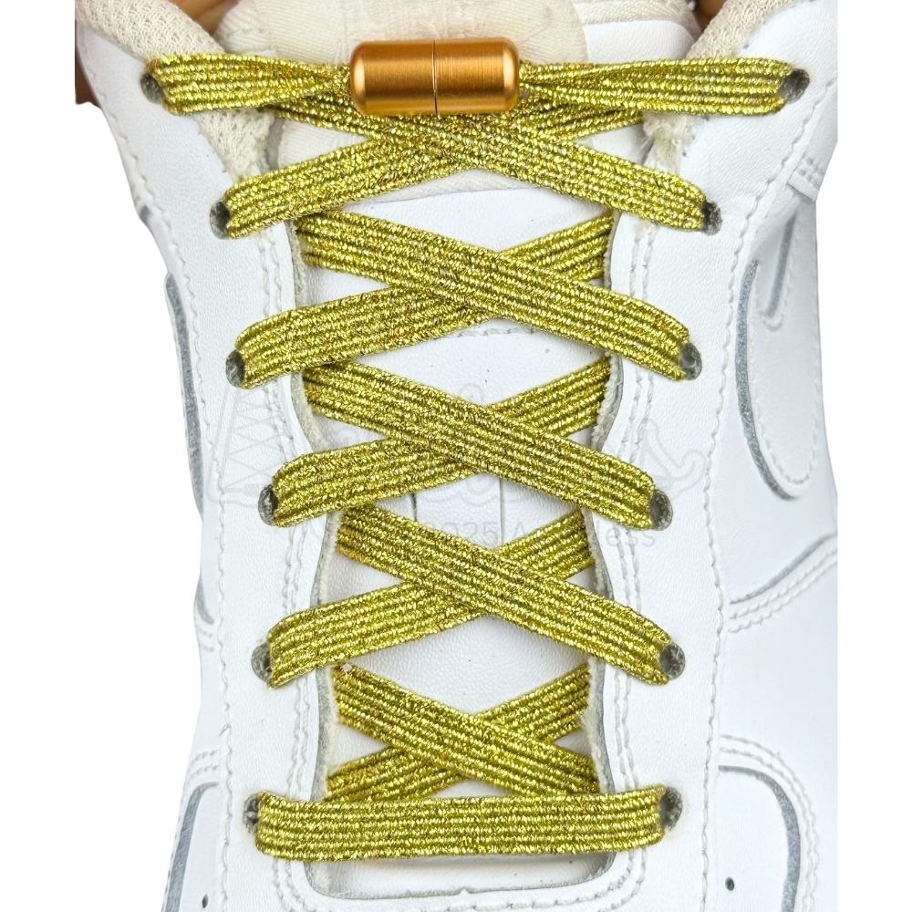 Elastische veters zonder strikken glitter 6mm capsule sluiting goud met stretch uitgerekt