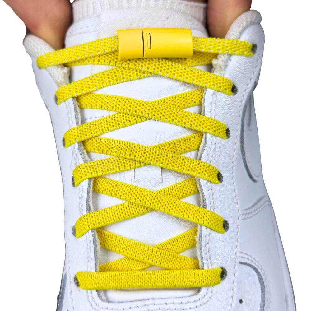 Elastische veters zonder strikken plat 6mm magnetische sluiting geel met stretch uitgerekt