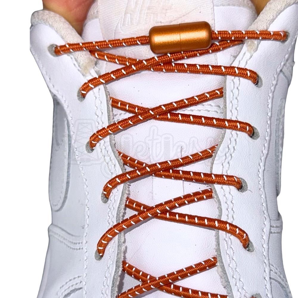 Elastische veters zonder strikken reflecterend 3mm capsule sluiting bronze met stretch uitgerekt