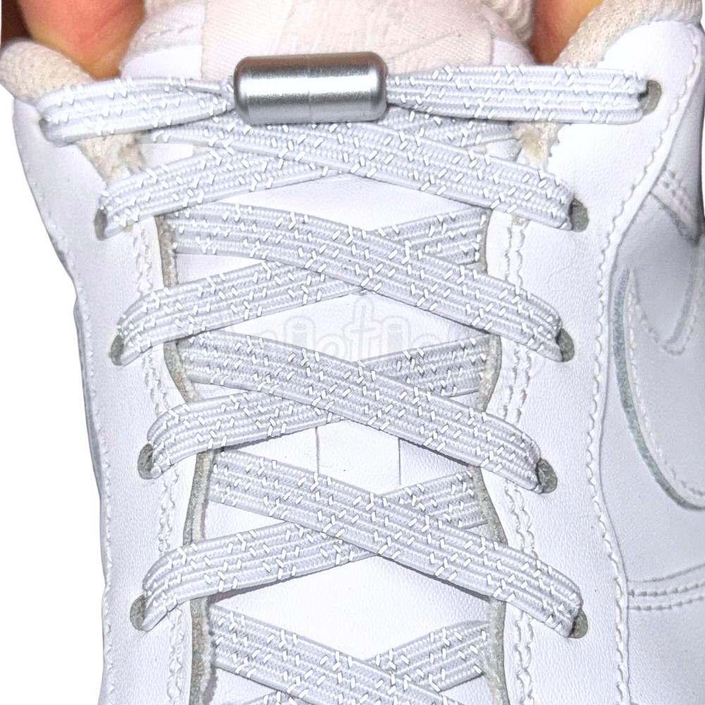 Elastische veters zonder strikken reflecterend 7mm capsule sluiting wit met stretch uitgerekt