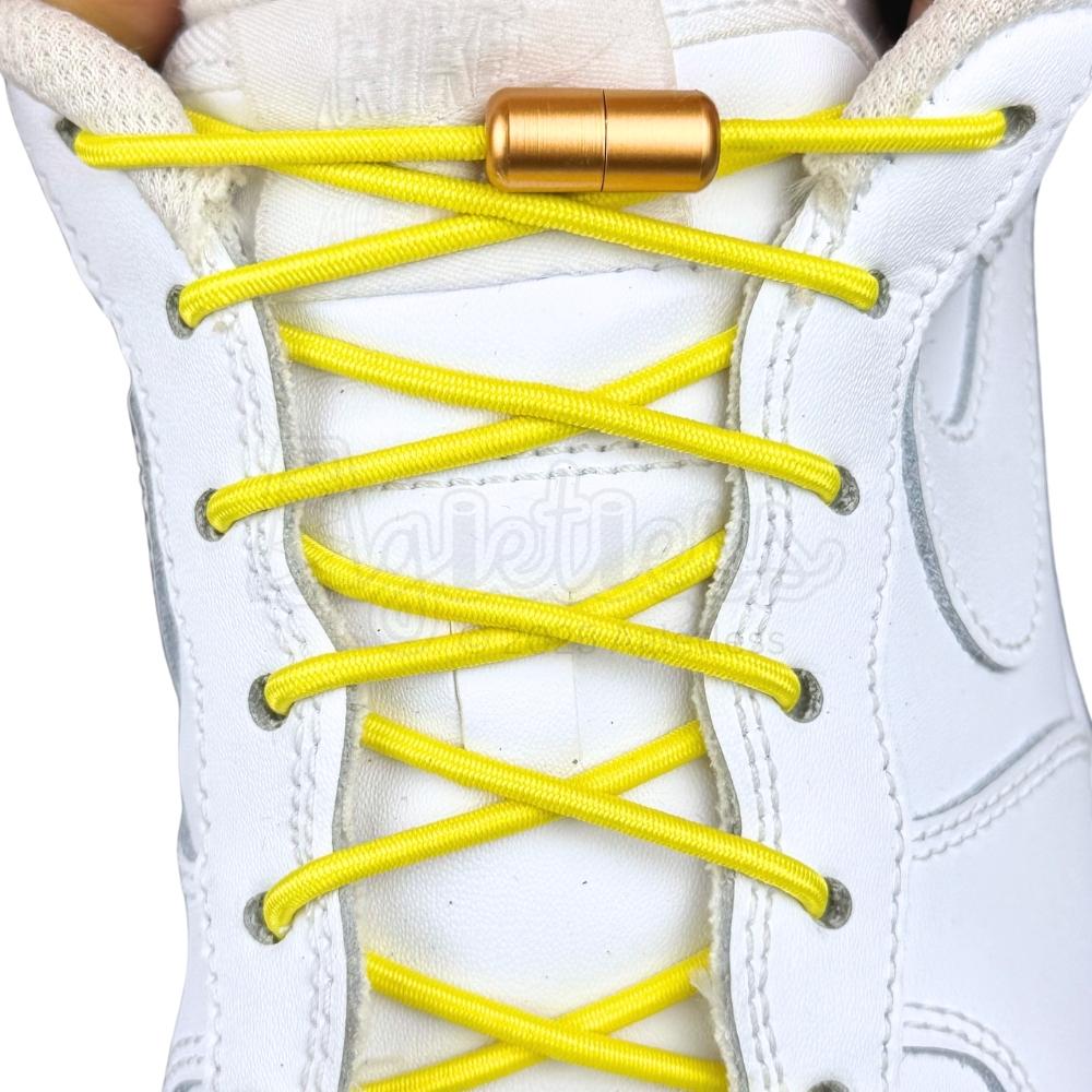 Elastische veters zonder strikken rond 3mm capsule sluiting geel met stretch uitgerekt