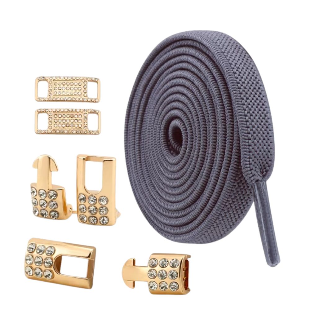 Donkergrijze platte elastische veters van 9 mm met gouden charm en strass haak als sluiting, voor een subtiele en tijdloze look.