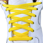 Elastische veters onzichtbaar strikken plat 8mm onzichtbare clipjes geel met stretch uitgerekt