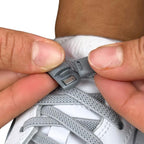 Elastische veters zonder strikken plat 6mm magnetische sluiting grijs detailfoto van hoe de sluiting werkt