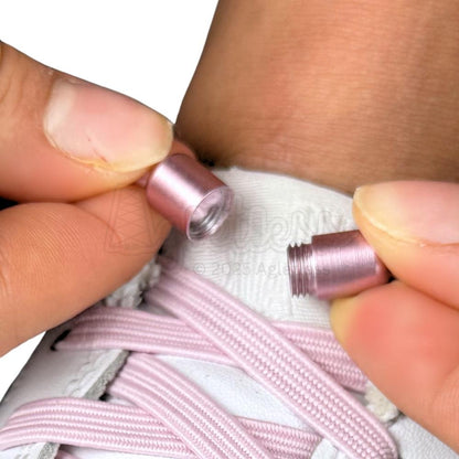 Elastische veters zonder strikken plat 7mm capsule sluiting roze detailfoto van hoe de sluiting werkt