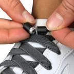 Elastische veters zonder strikken plat 9mm metalen draai capsule donkergrijs detailfoto van hoe de sluiting werkt