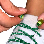 Elastische veters zonder strikken reflecterend 3mm capsule sluiting groen detailfoto van hoe de sluiting werkt