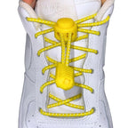 Elastische veters zonder strikken reflecterend 3mm lock sluiting geel met stretch uitgerekt