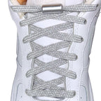 Elastische veters zonder strikken reflecterend 7mm capsule sluiting grijs met stretch uitgerekt