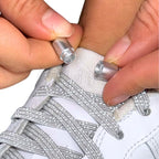 Elastische veters zonder strikken reflecterend 7mm capsule sluiting grijs detailfoto van hoe de sluiting werkt