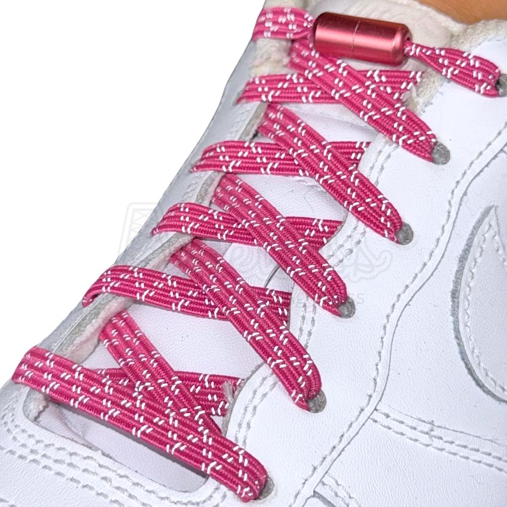 Elastische veters zonder strikken reflecterend 7mm capsule sluiting rozenrood detailfoto van hoe de sluiting werkt