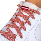 Elastische veters zonder strikken reflecterend 7mm capsule sluiting zalmroze detailfoto van hoe de sluiting werkt