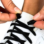 Elastische veters zonder strikken rond 5mm capsule sluiting zwart detailfoto van hoe de sluiting werkt