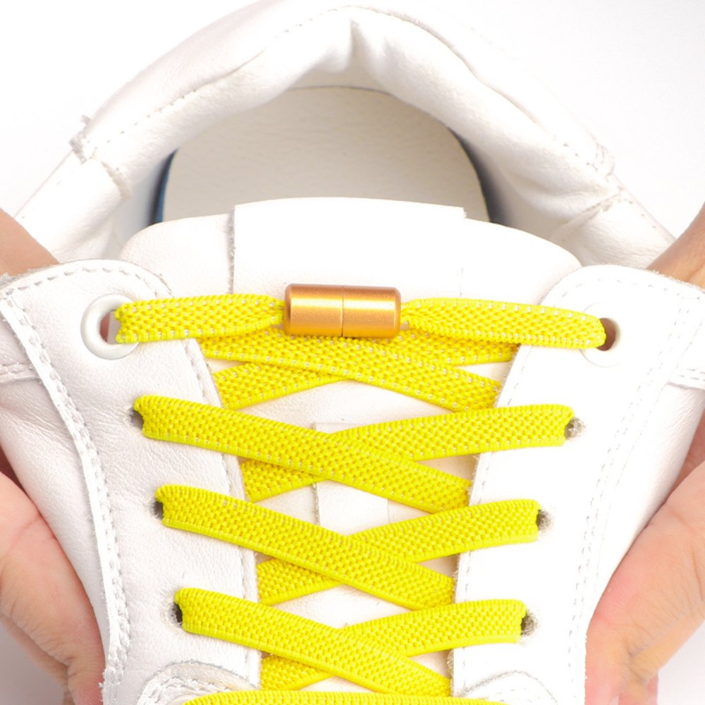 flat-elastic-no-tie-shoelaces-yellow-twist-capsule-displayed-on-sneaker-stretch