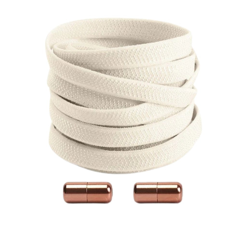 Beige textured elastic no-tie shoelaces with a twist capsule lock.